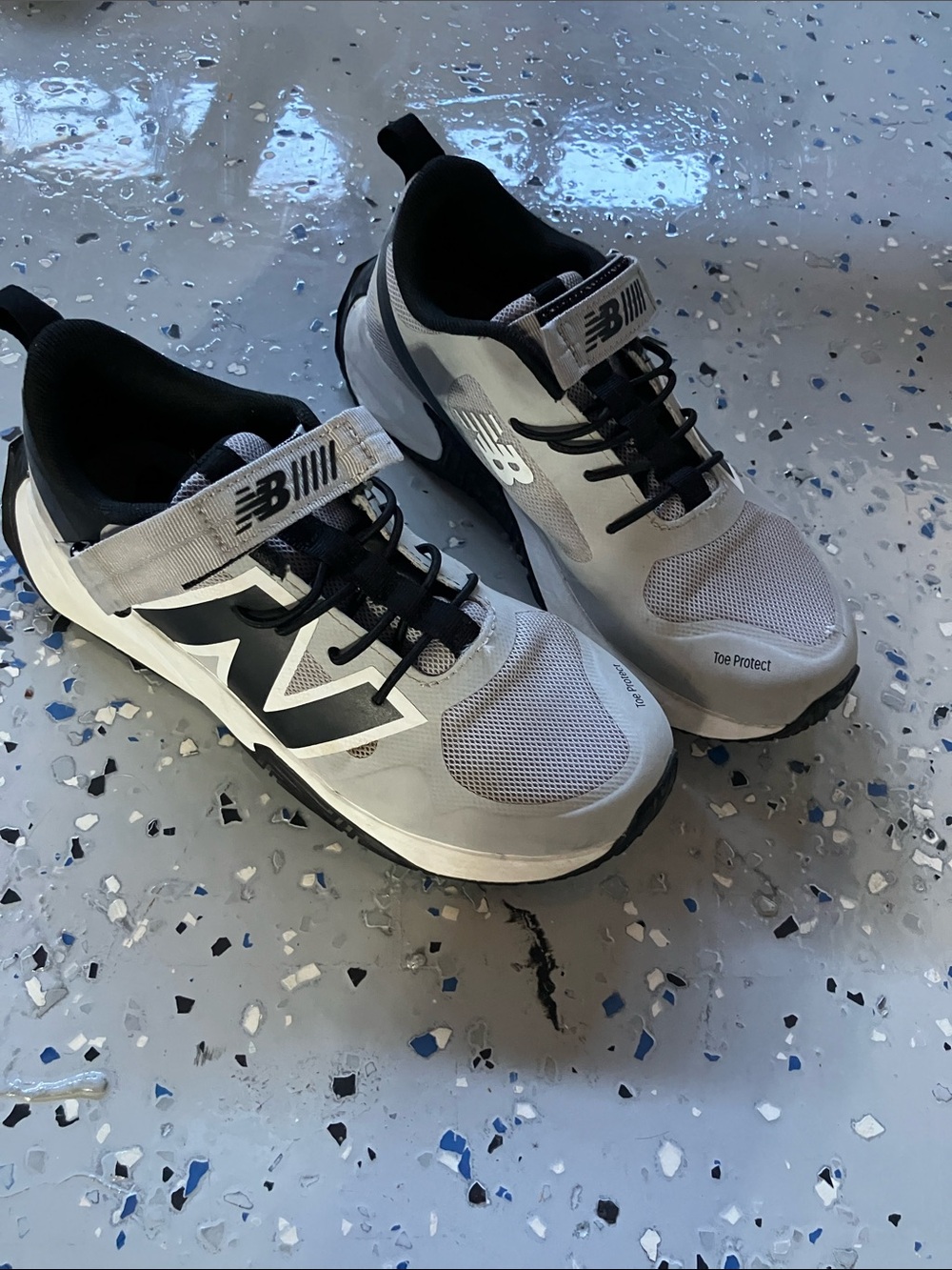 New Balance kids Gray and Black Athletic Sneakers with Strap
